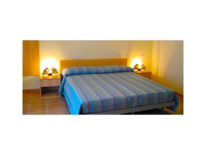 Postel nebo postele na pokoji v ubytování B&B & Residence Pozzo Misseo