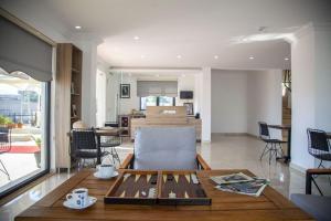 a living room with a table and a couch at Demyra Boutique Hotel in Demre