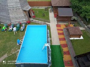 a model of a house with a swimming pool at VIOLETTA in Slavske