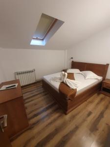 Postel nebo postele na pokoji v ubytování Casa Vlad