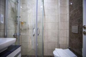 Ванна кімната в Demyra Boutique Hotel