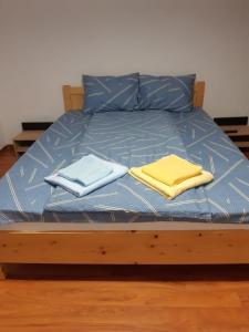 Postel nebo postele na pokoji v ubytování CASA CATERINA JURILOVCA