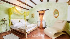 Postel nebo postele na pokoji v ubytování Villa Karim
