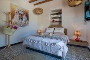 Postel nebo postele na pokoji v ubytování Absolu Beldi Essaouira