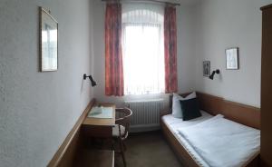 Кровать или кровати в номере Hotel Zur Rose