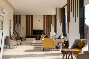 Гостиная зона в The Palace Hotel Suites - Al Badea