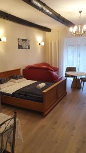 a bedroom with a large bed in a room at Agroturystyka Burylowka in Osiecznica +94 photos