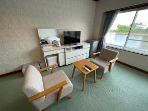 TV a/nebo společenská místnost v ubytování Marina Hotel Kaikuu