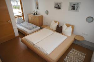 Ένα ή περισσότερα κρεβάτια σε δωμάτιο στο Appart Manuela