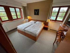 Posteľ alebo postele v izbe v ubytovaní Hotel Oddech + 37 fotografií