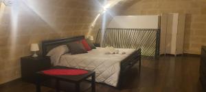 Postel nebo postele na pokoji v ubytování Il Brigante