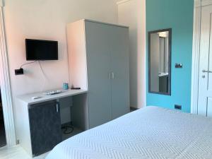 Postel nebo postele na pokoji v ubytování B&B I Colori Dell'Isola