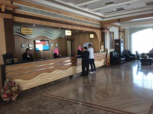 The lobby or reception area at Noras Beach Hotel