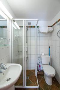 Phòng tắm tại Vila Ula