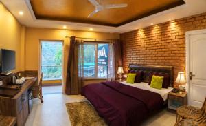 Ένα ή περισσότερα κρεβάτια σε δωμάτιο στο Nirvana Holiday Apartment by Nature Nests