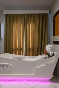 Voodi või voodid majutusasutuse Seawater Hotel Bio & Beauty Spa toas