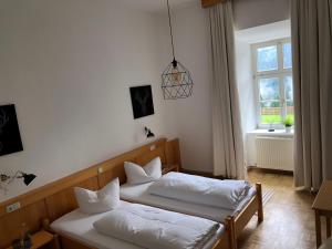 Posteľ alebo postele v izbe v ubytovaní Maria Waldrast