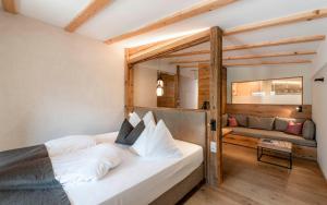 Posteľ alebo postele v izbe v ubytovaní Falkensteiner Hotel & Spa Falkensteinerhof