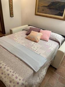Posteľ alebo postele v izbe v ubytovaní la casa nel bosco