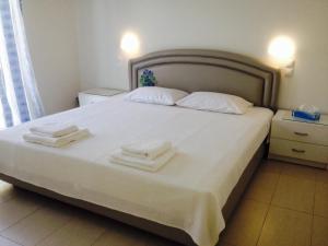 Postel nebo postele na pokoji v ubytování Zante Vista Villas