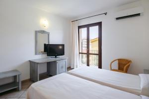 Postelja oz. postelje v sobi nastanitve Hotel Angedras