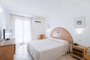 Postelja oz. postelje v sobi nastanitve Hotel Angedras