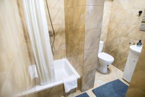 Kúpeľňa v ubytovaní Apartamenty Centrum Biskupiec