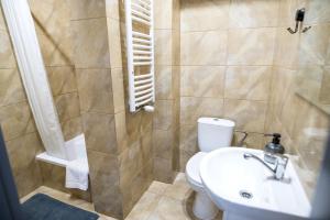 Kúpeľňa v ubytovaní Apartamenty Centrum Biskupiec