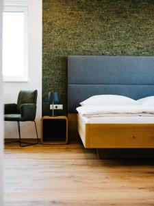 Posteľ alebo postele v izbe v ubytovaní Weingut Straka