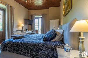 Postel nebo postele na pokoji v ubytování Château de Vidaussan + 33 fotografií