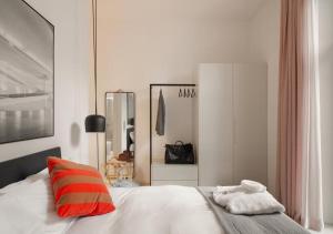 Posteľ alebo postele v izbe v ubytovaní BB Hotels Aparthotel Collection Il Michelangelo