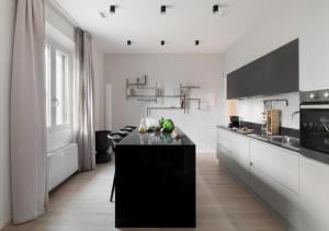 Kuchyňa alebo kuchynka v ubytovaní BB Hotels Aparthotel Collection Il Michelangelo