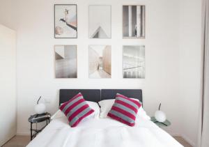 Posteľ alebo postele v izbe v ubytovaní BB Hotels Aparthotel Collection Il Michelangelo