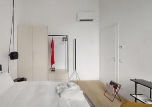 Posteľ alebo postele v izbe v ubytovaní BB Hotels Aparthotel Collection Il Michelangelo