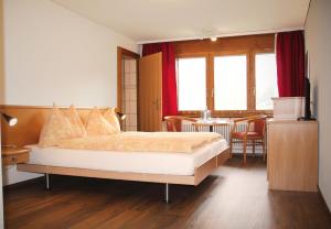 Letto o letti in una camera di Hotel Eigerblick