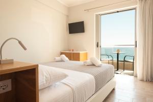 Postel nebo postele na pokoji v ubytování Soñar en el mar