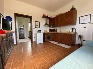 A kitchen or kitchenette at Villetta a Corigliano D'Otranto
