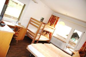 Voodi või voodid majutusasutuse Hotel Eigerblick toas