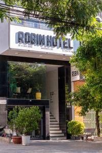 a building with a sign that reads roeland hospital at Robin Hotel Danang in Da Nang