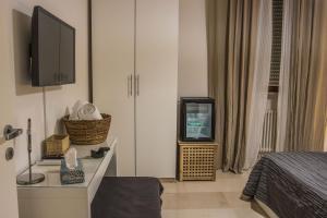 TV a/nebo společenská místnost v ubytování B&B Colonna - Mole Sua Stat