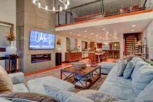 a living room with a couch and a table at 605 Deer Valley Drive in Park City