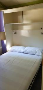 Letto o letti in una camera di Camping Fossa Lupara