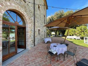 Reštaurácia alebo iné gastronomické zariadenie v ubytovaní Villa Preselle Country Resort