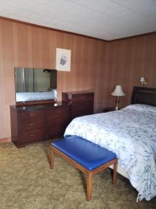 Katil atau katil-katil dalam bilik di Olympia Motel