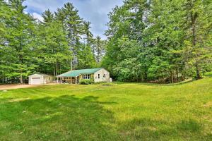 a house in the middle of a field with trees at Serene House Less Than 2 Mi to Cranmore and N Conway Shops! in North Conway