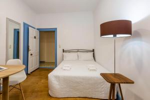 Postel nebo postele na pokoji v ubytování VAP Suites + 67 fotografií