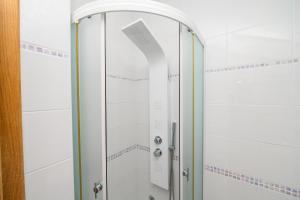 Kúpeľňa v ubytovaní Apartmani Loreta