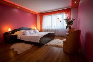 Katil atau katil-katil dalam bilik di Bajeczny Wypoczynek Apartamenty