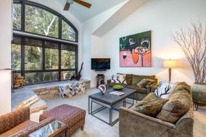 a living room with two couches and a table at Stonebridge #1145 in Park City