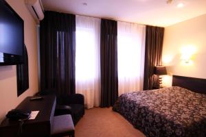 Postel nebo postele na pokoji v ubytování Hotel Felicia